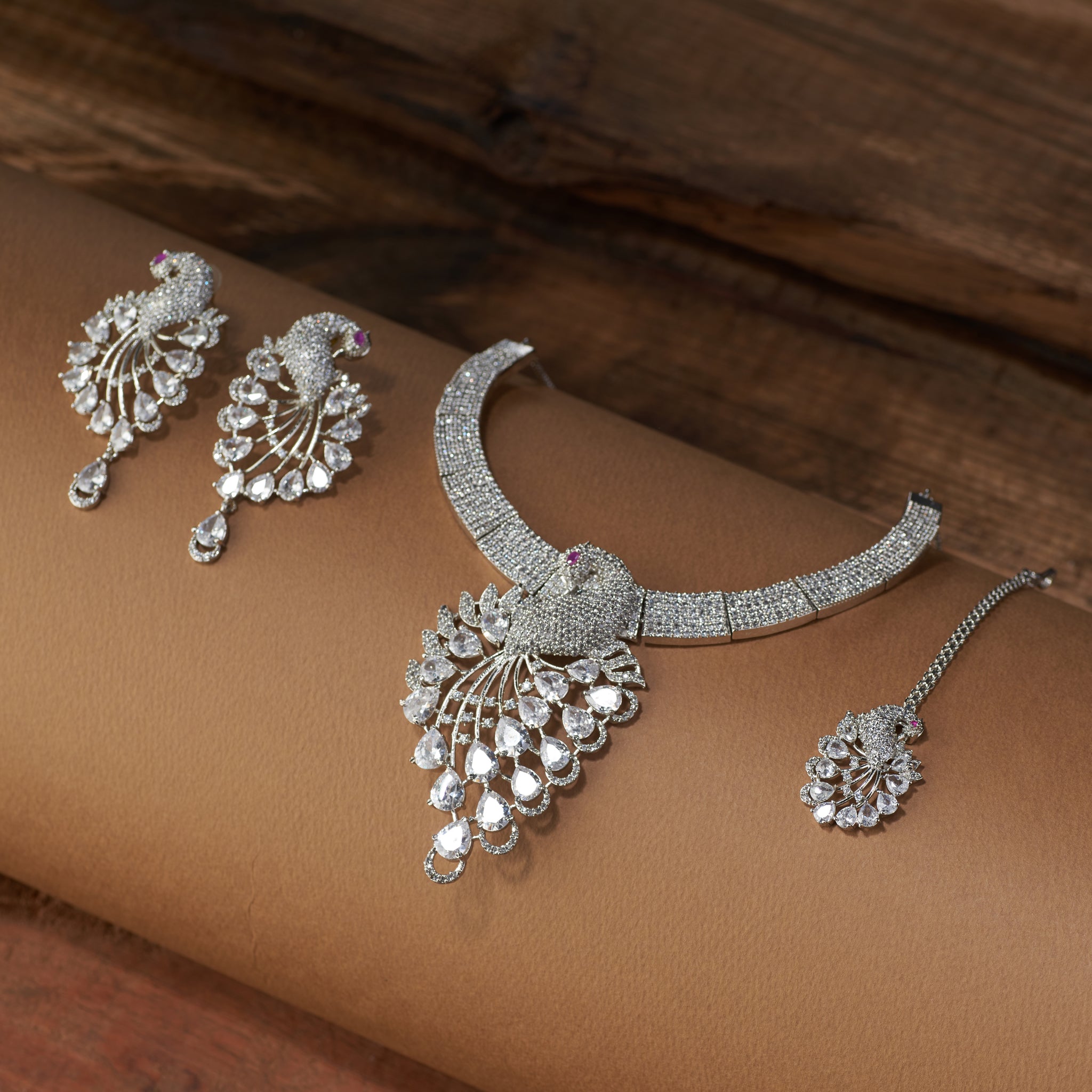 Peacock design American diamond necklace set with earrings and maang tikka – bridal and party wear jewellery