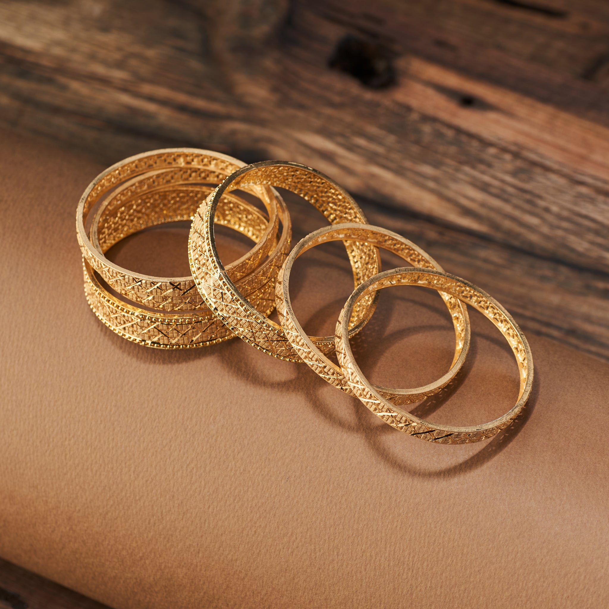 Gold forming replica bangles set of 6 with intricate lattice design – traditional jewellery for weddings, parties, and festive occasions.