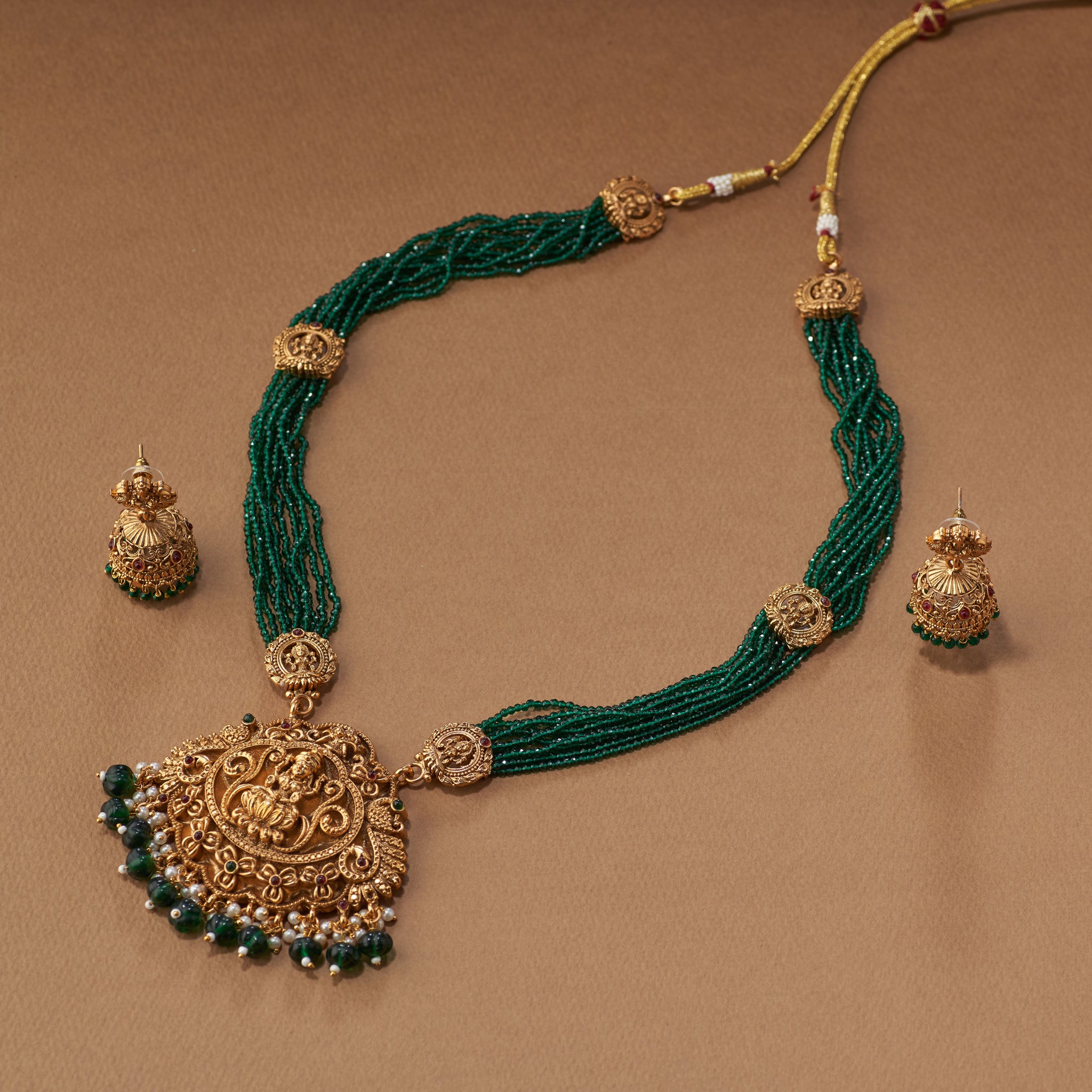 Emerald green beads South Indian Temple Lakshmi necklace and earrings Matt gold finish.