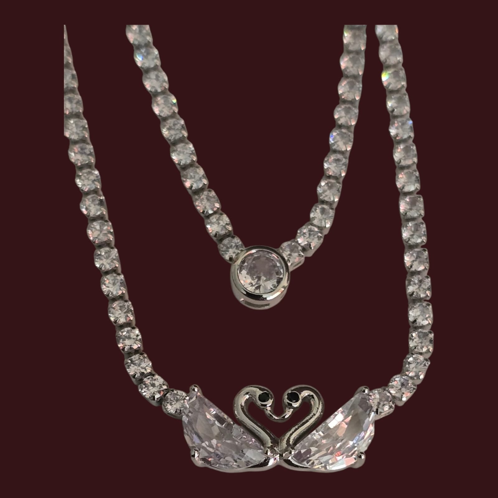 Trendy indo-wester CZ necklace - double layer, silver finish swan pendant