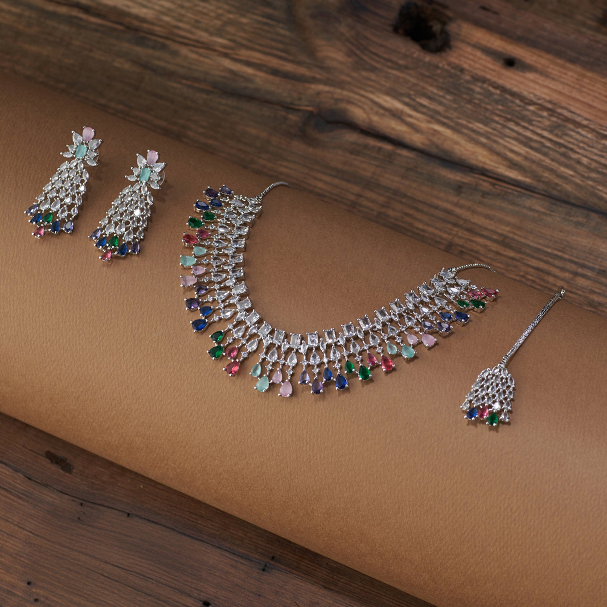 American diamond silver plated multi colour bridal set with earrings and maang tika.