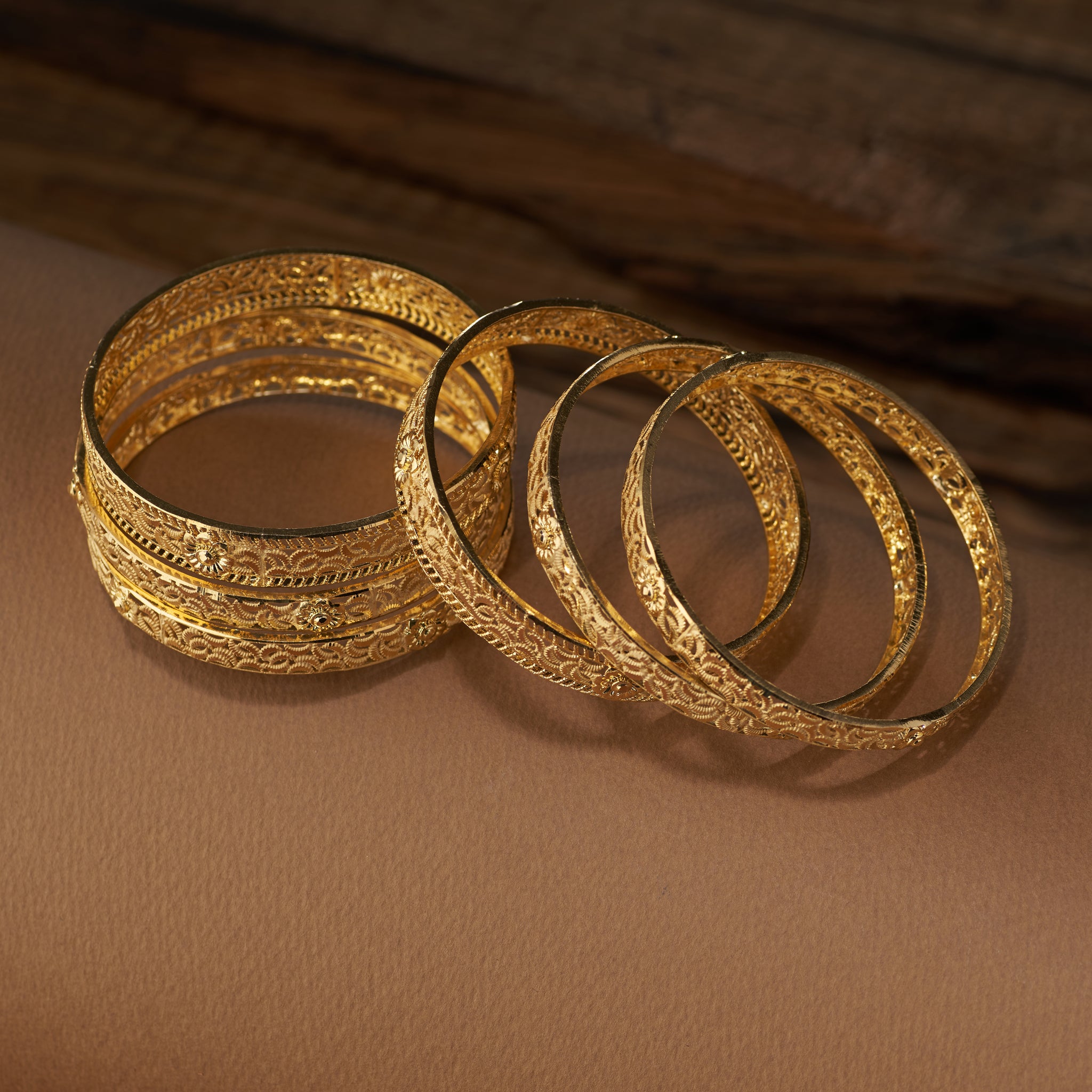 Gold forming replica bangles set of 6 with intricate lattice floral design – traditional jewellery for weddings, parties, and festive occasions.