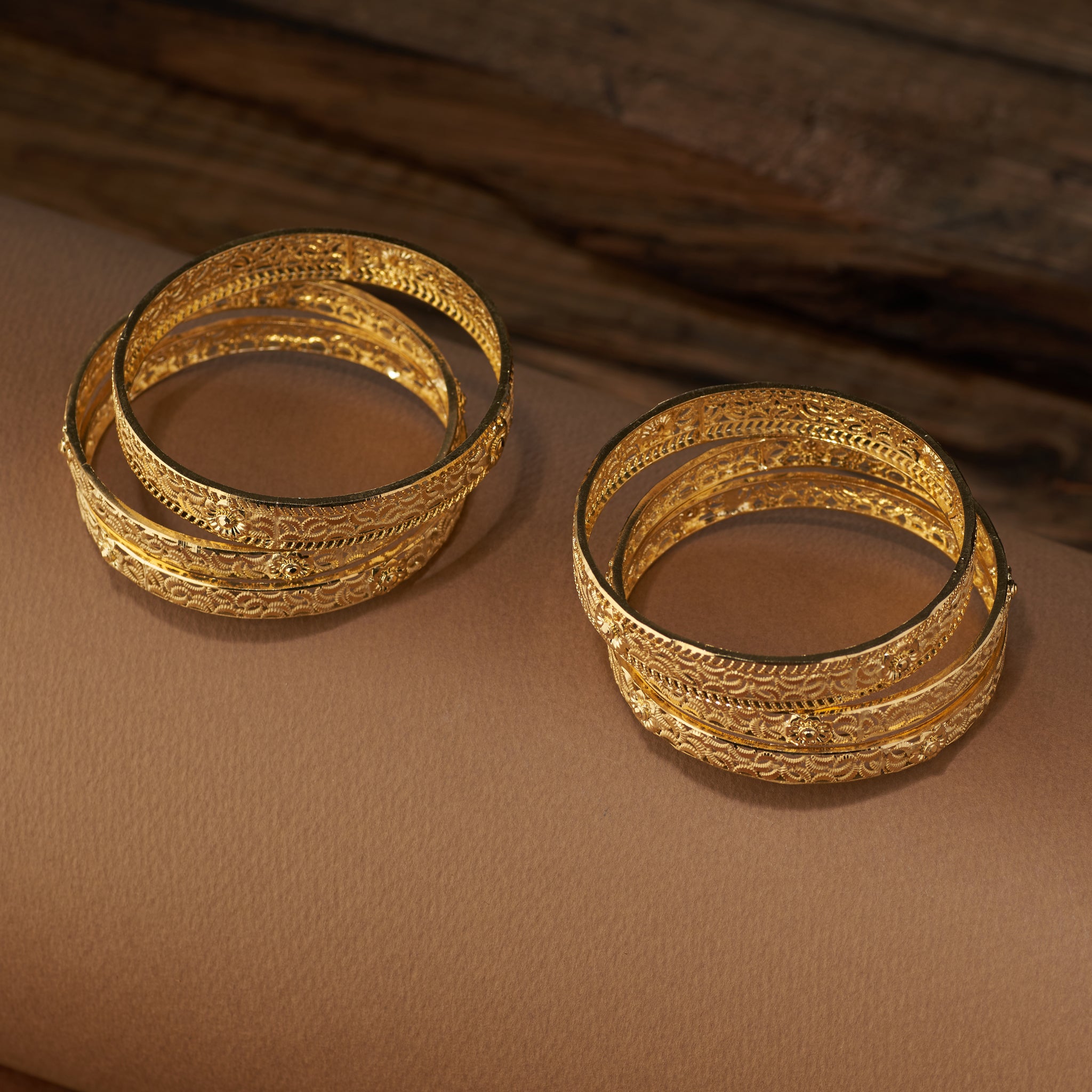 Gold forming replica bangles set of 6 with intricate lattice floral design – traditional jewellery for weddings, parties, and festive occasions.