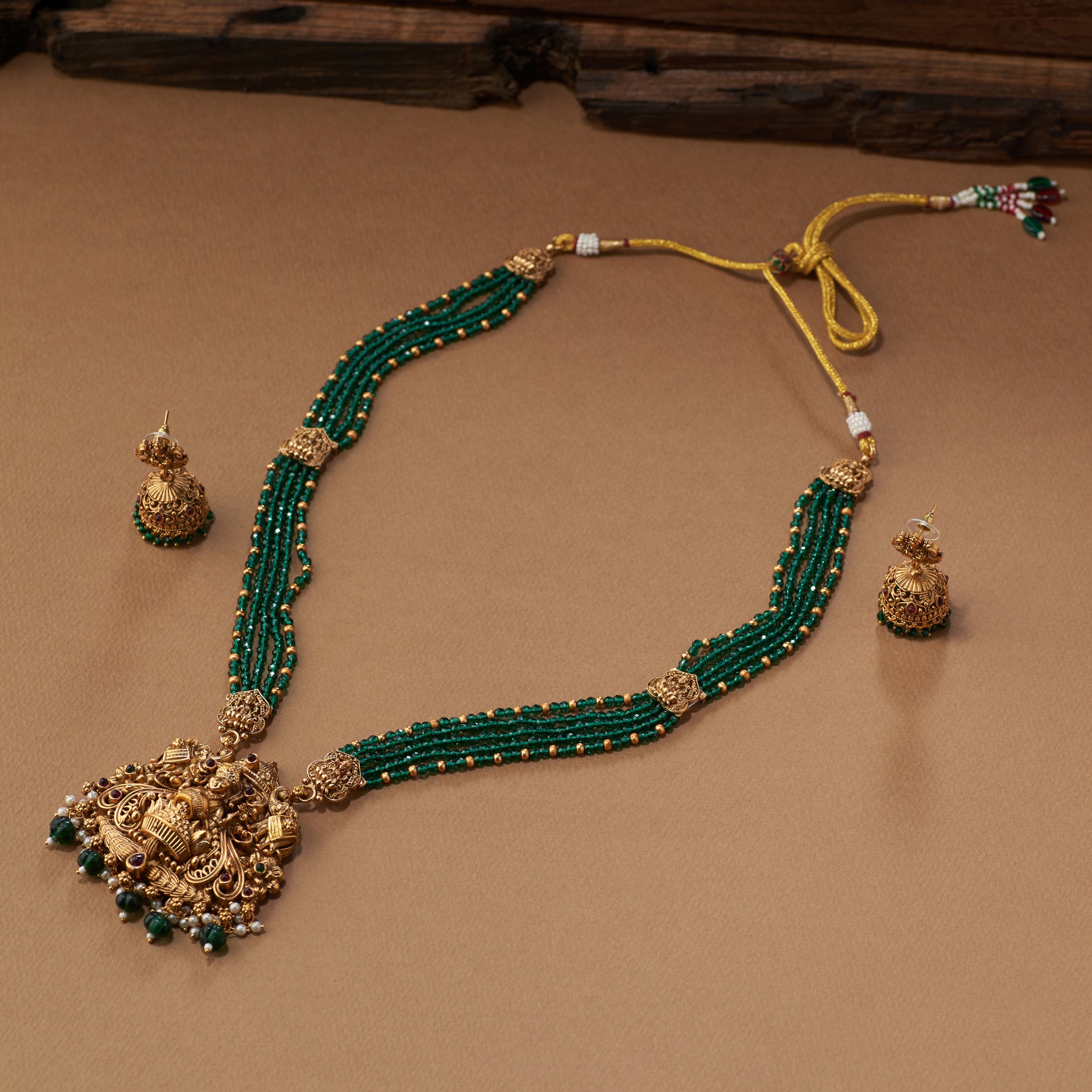 Gold and green beaded South Indian Temple Lakshmi necklace with matching earrings, Matt gold plated.