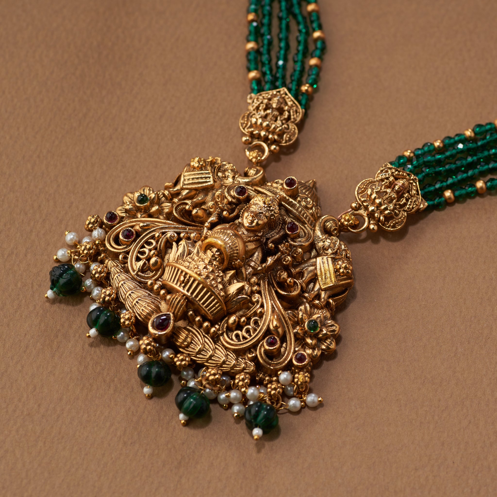 Gold and green beaded South Indian Temple Lakshmi necklace with matching earrings,  intricate design. Matt gold plated.