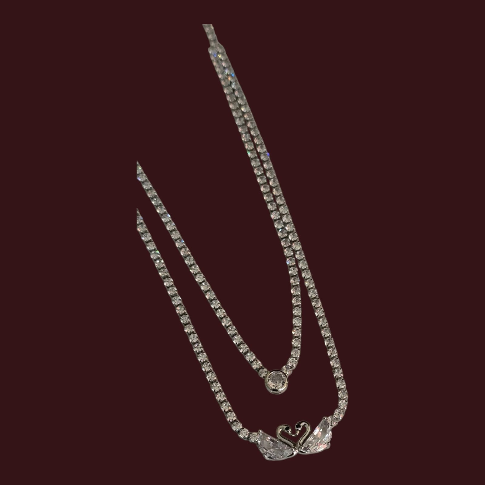 Trendy indo-wester CZ necklace - double layer, silver finish swan pendant