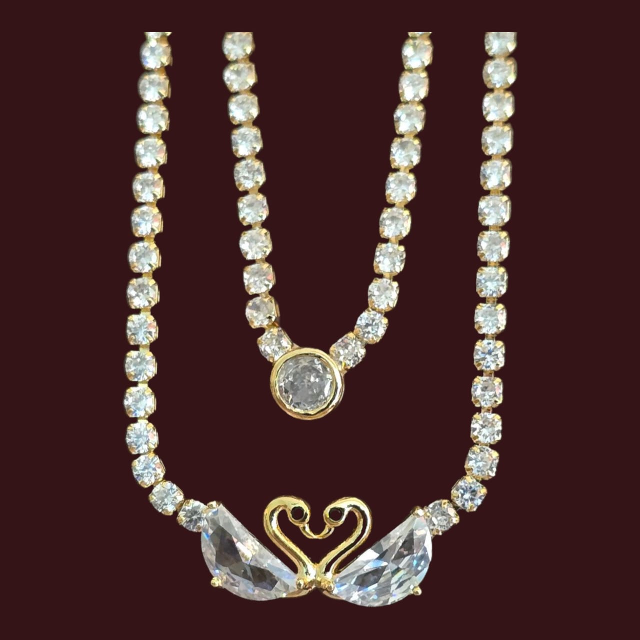 Trendy indo-western CZ necklace gold finish- swan pendant
