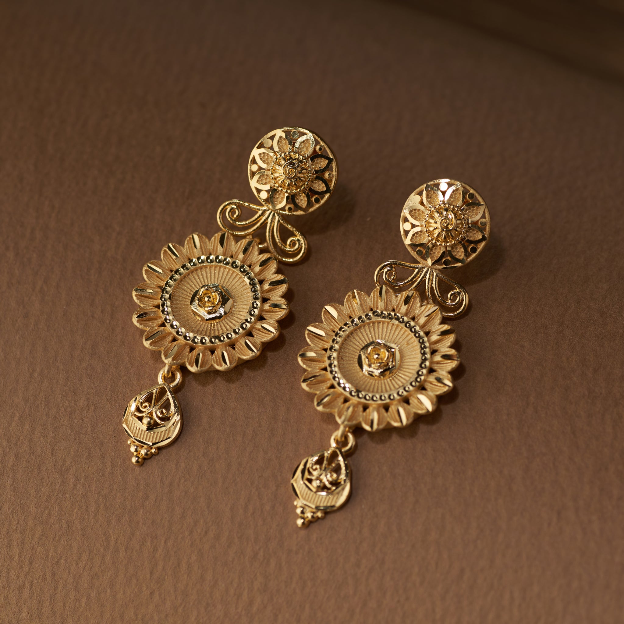 floral motifs  earrings high gold and bead detailing